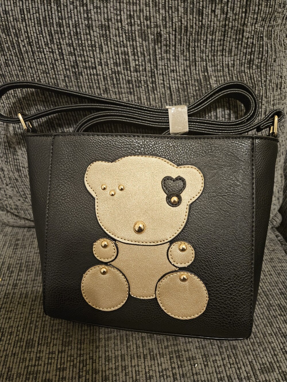 Black Crossbody Bag with Gold Teddy Accent